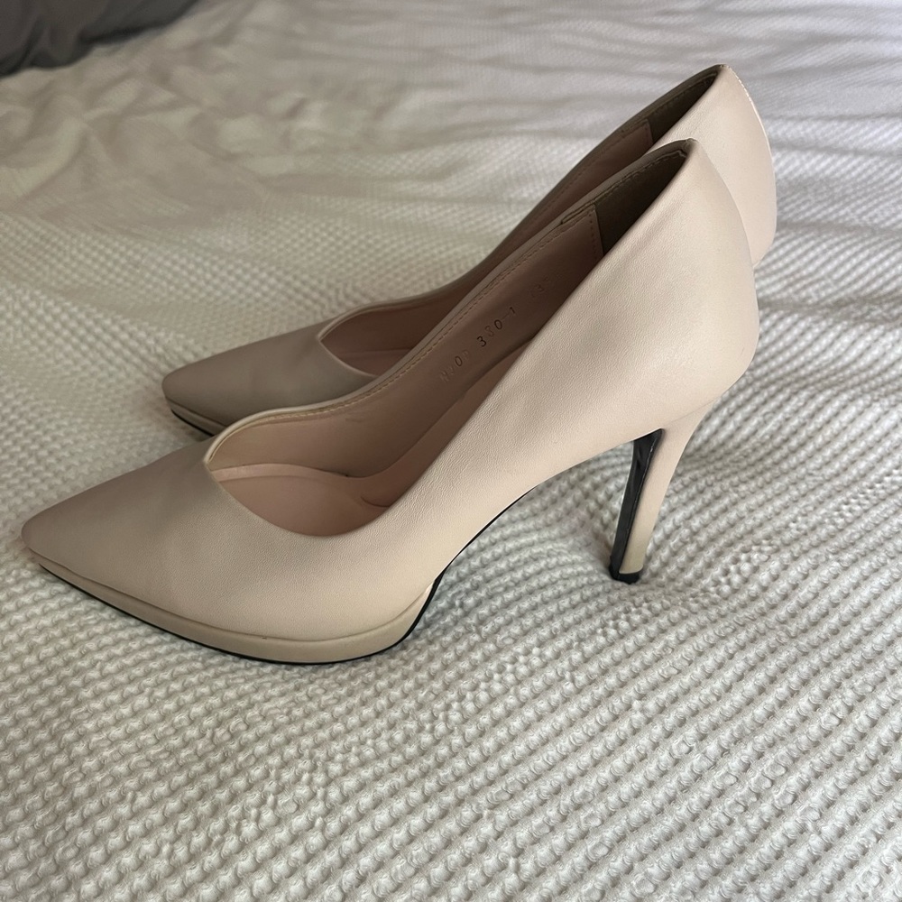 Beige platform pumps heels